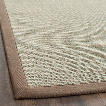 Tapis en sisal à bordure Madelyn en fibres naturelles SAFAVIEH