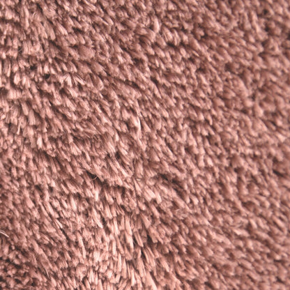 Tapis doux et lavable avec envers antidérapant, disponible en couleurs unies.