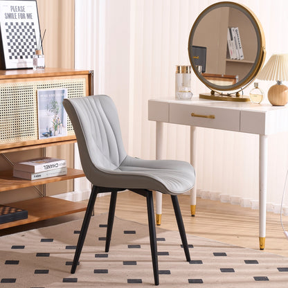 Ensemble de 2 chaises de salle à manger modernes sans accoudoirs, revêtues de cuir.